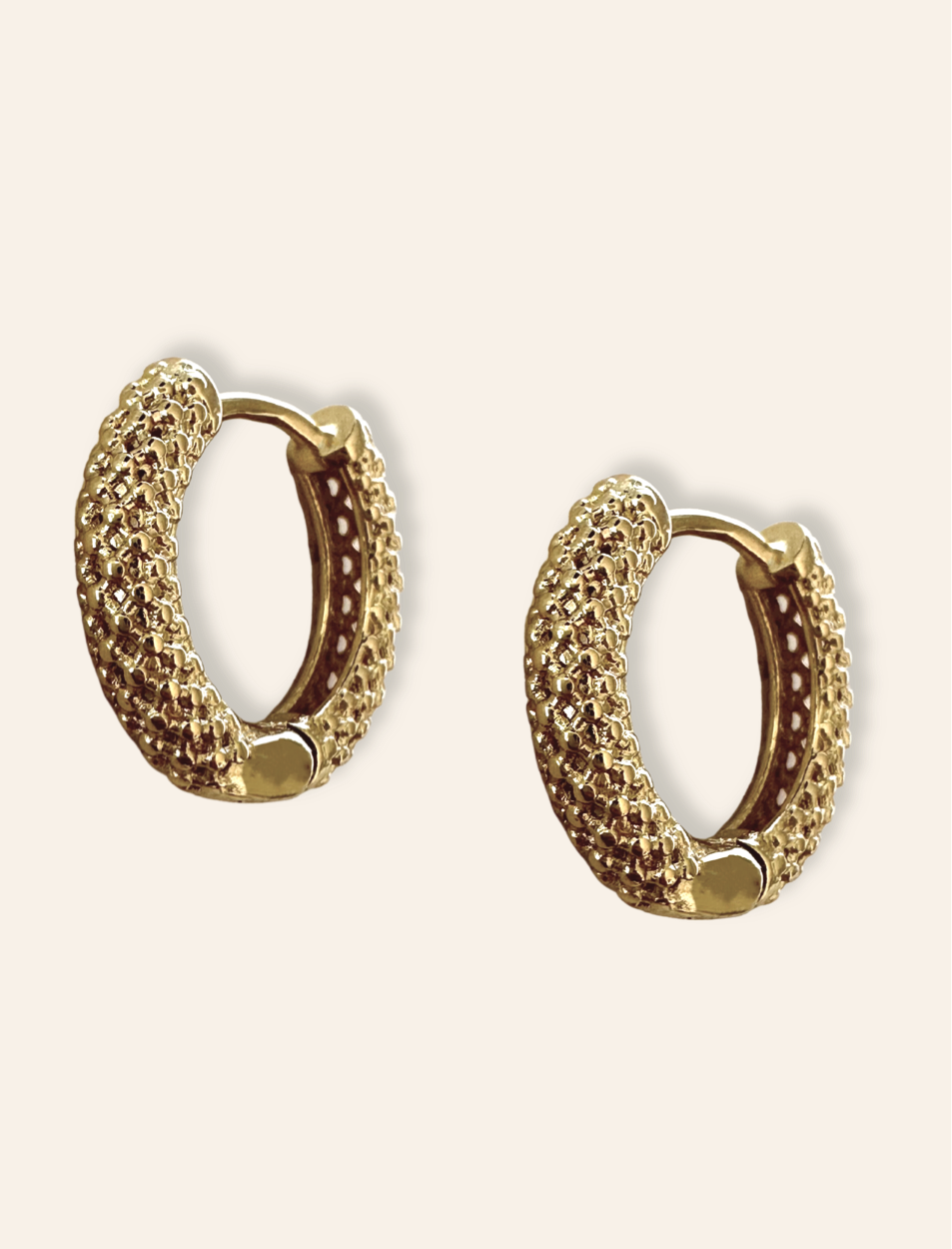 hailey bieber hoops featuring chunky earrings gold. Summer jewelry trends