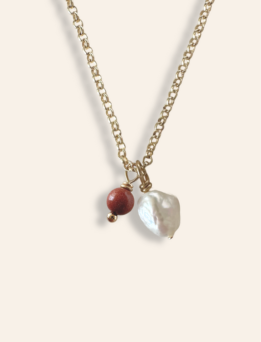 Dainty gold necklace with crystal pendant. Gold belcher chain necklace with goldstone charm. Necklaces designed to stack