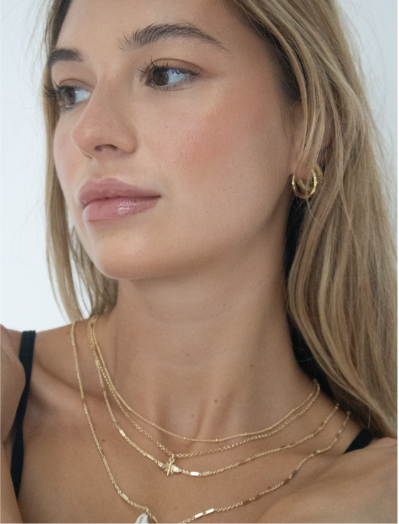 everyday jewellery featuring gold chains, gold necklaces, gold earrings, and gold pendants