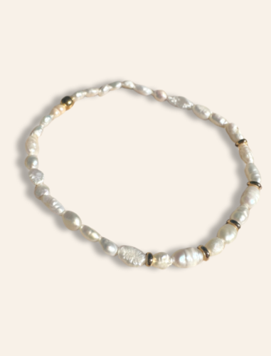 keshi pearl bracelet with gold beads. Handmade jewelry designed to layer and stack