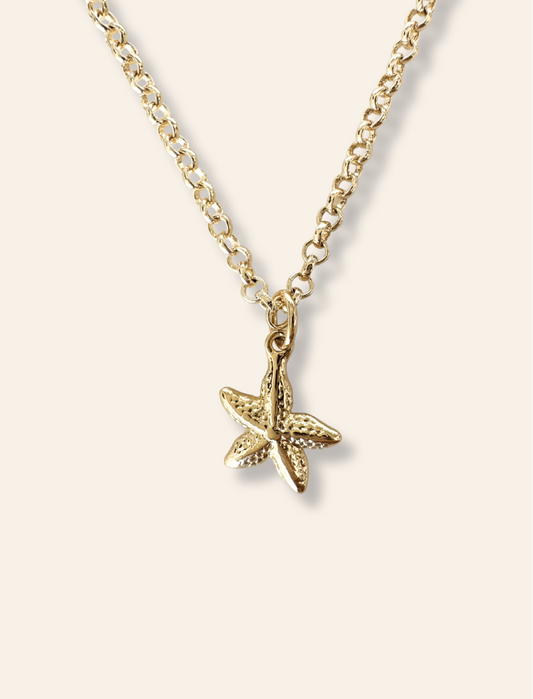 starfish necklace gold on dainty belcher chain. Necklaces for stacking